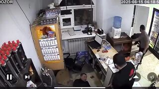 Two guys rob a store at knifepoint, then big dude beats the crap out of them