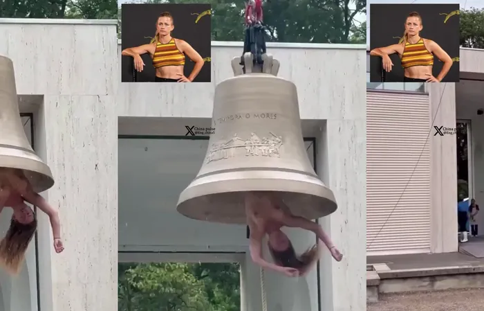 Weirdo activist hangs topless inside a giant bell