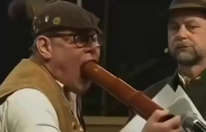 This looks like Tim Walz sucking on wood