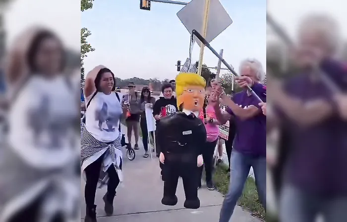 Wearing shirt about "kindness" while being violent