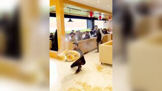 Indian dude tries serving food on roller skates