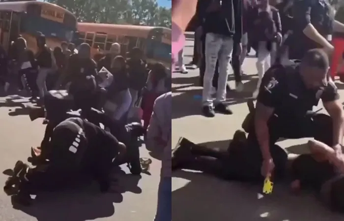 Cop body-slammed a female student during brawl, now HE's the one in trouble