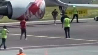 WTF??? 35-year-old Andrea Russo jumps into jet engine