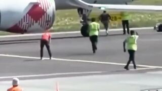 WTF??? 35-year-old Andrea Russo jumps into jet engine