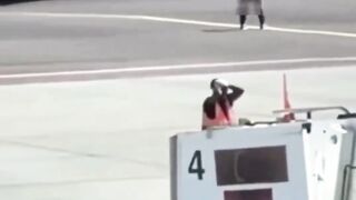 WTF??? 35-year-old Andrea Russo jumps into jet engine