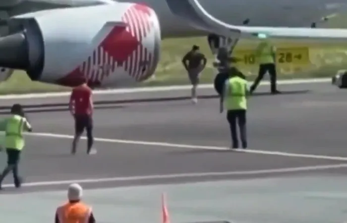WTF??? 35-year-old Andrea Russo jumps into jet engine