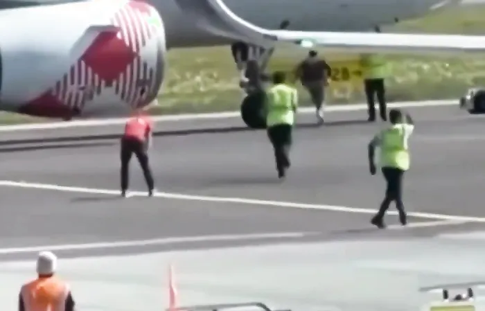 WTF??? 35-year-old Andrea Russo jumps into jet engine