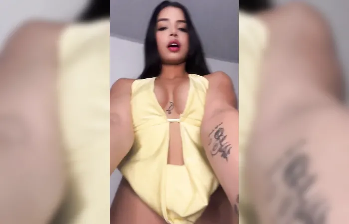 What is she riding on?