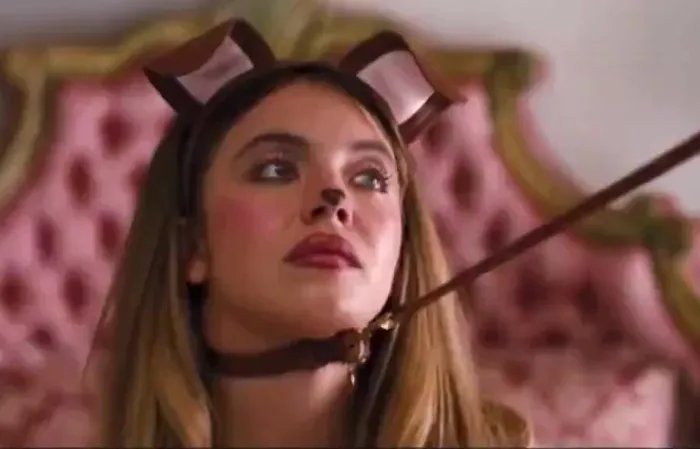 Sydney Sweeney doing puppy play in a leash