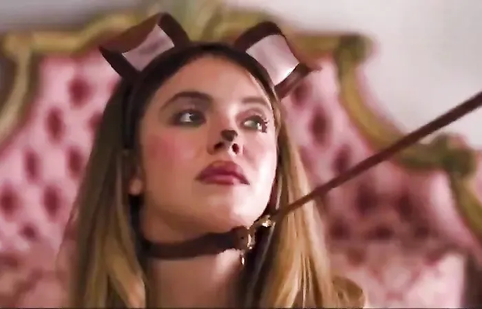 Sydney Sweeney doing puppy play in a leash