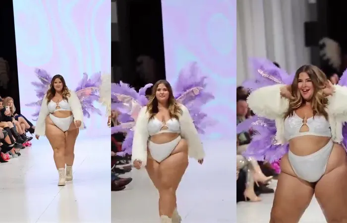 Plus size woman struts on the runway