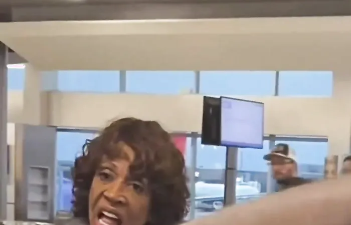 Maxine Waters appears confused at the airport