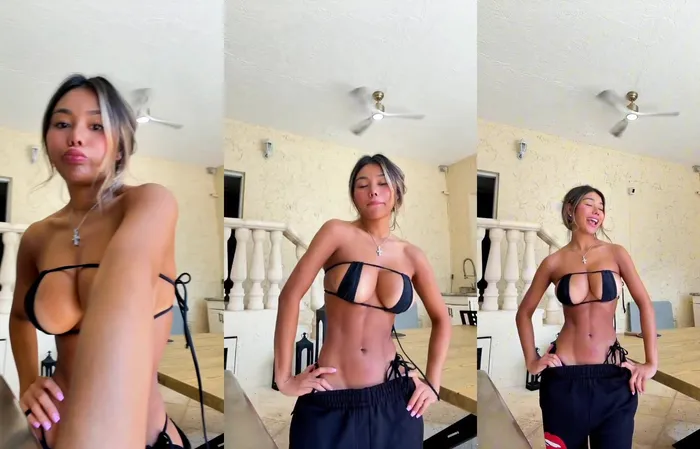 How is she not falling out of this?
