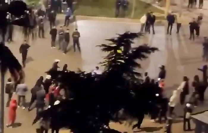 Pikachu runs from the cops at protest