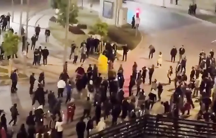 Pikachu runs from the cops at protest