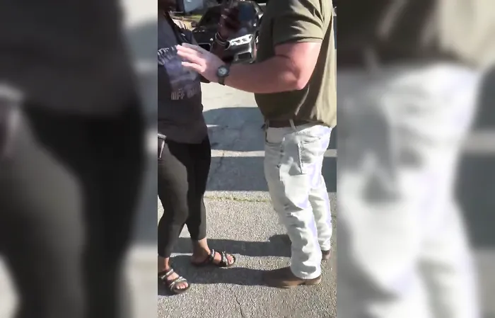Hero dad drops armed woman like an anvil