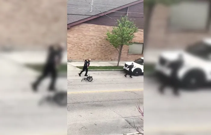 Guy escapes fight with cop, rides away on bicycle