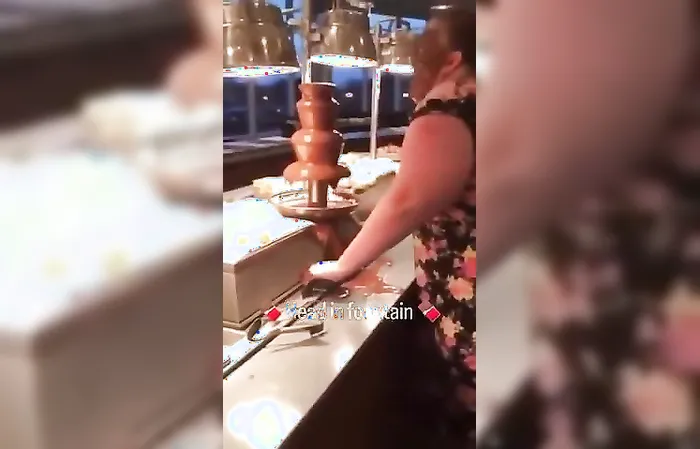 Really lady, sticking your face IN THE FOOD?