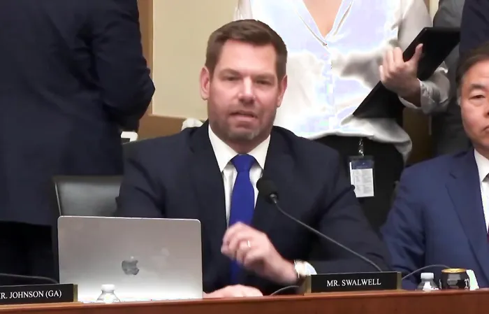 Did Pam Bondi get fired for TIPPING OFF ERIC SWALWELL?