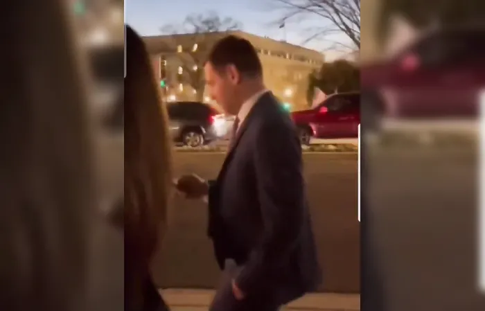 Who is the woman with Eric Swalwell? Is that not his wife?