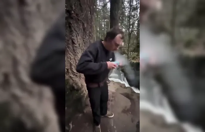 Bro hits a splif, chugs a beer, lights himself on fire and flips into waterfall