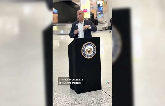 Cory Booker speaks to an empty Newark Airport lmfao