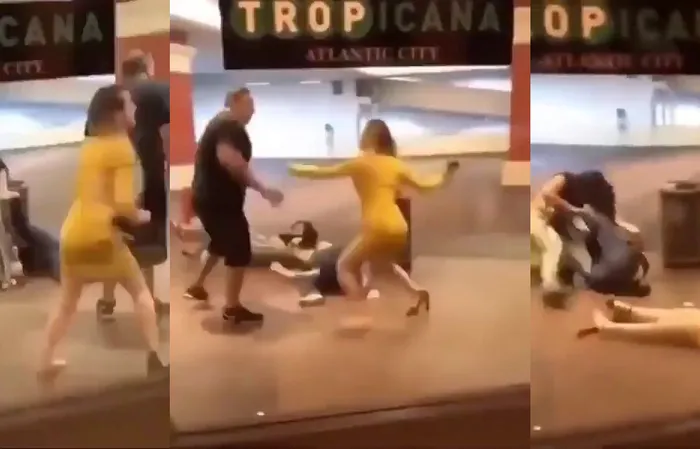 Guy slaps this woman who tried jumping his wife at Tropicana in AC