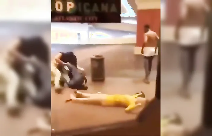 Guy slaps this woman who tried jumping his wife at Tropicana in AC