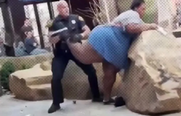 Officers dealing with a shoplifting suspect at Sephora
