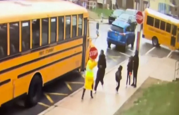 Thug knocks out school crossing guard just outside Philly