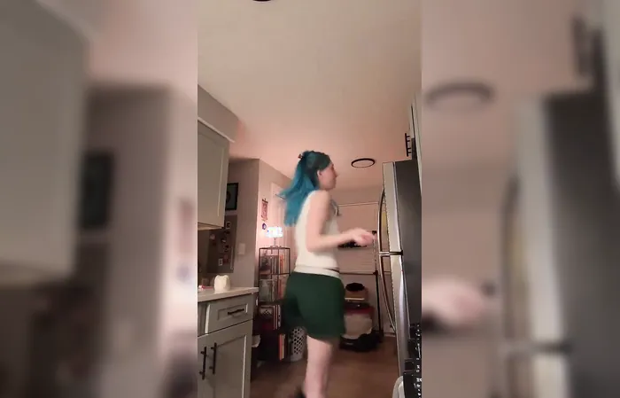 ICE-hating chick spills coffee all over during her revolution dance