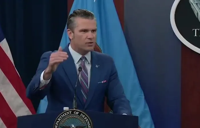 Hegseth didn't flinch, stared at the camera to say it