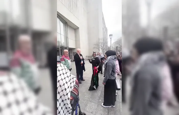 Lunatic Marine got arm snapped by a Senator, walks out like this