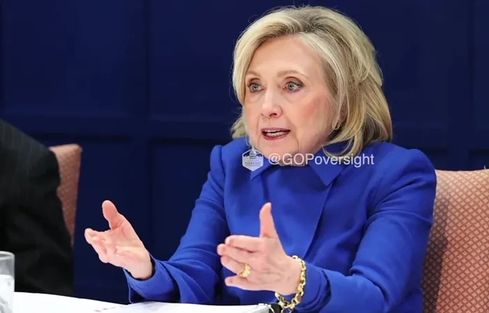 Hillary went all out in her BLUE DRESS