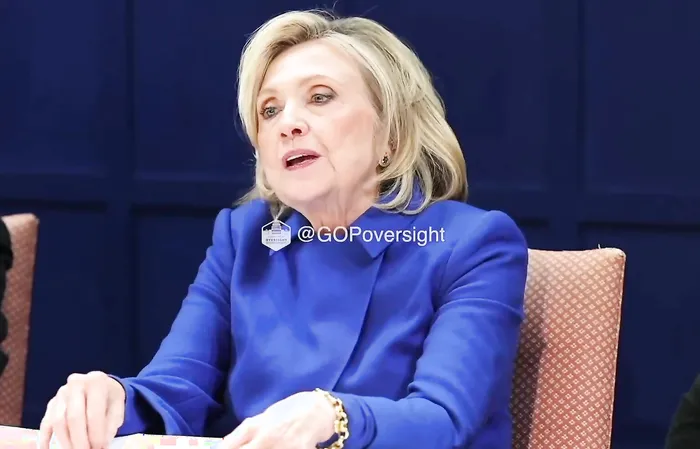 Hillary went all out in her BLUE DRESS