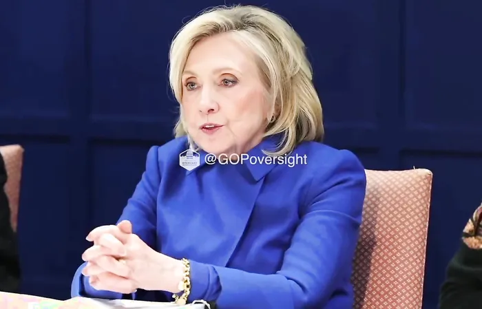 Hillary went all out in her BLUE DRESS