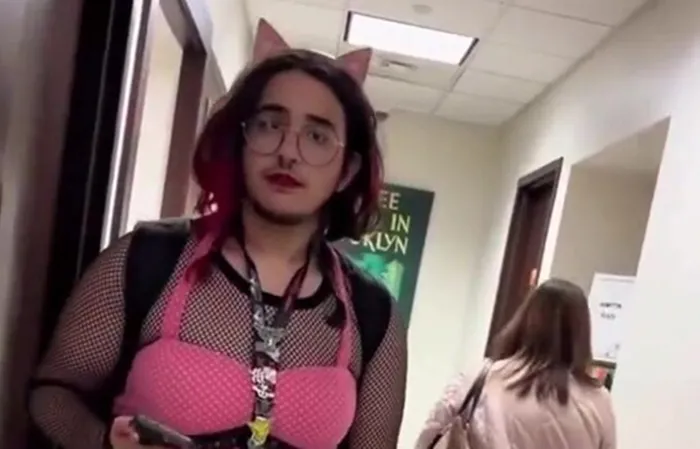 Woman protects daughter from dude trying to go in women's bathroom
