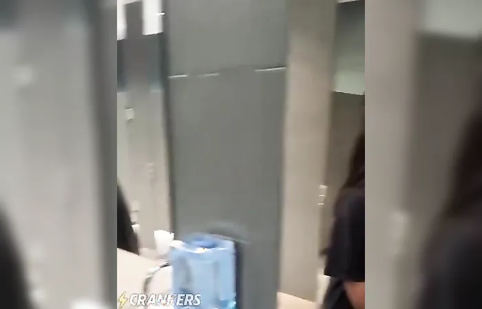 WHAT is that guy doing in the women's bathroom?