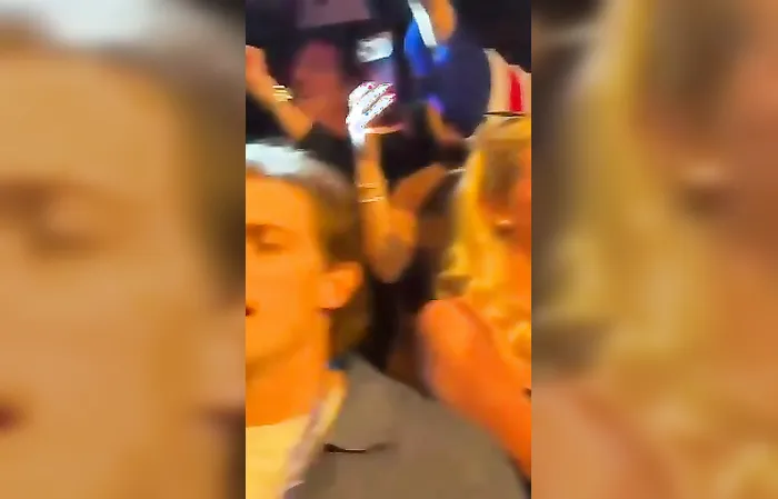 Men's USA hockey team sings National Anthem at Miami nightclub