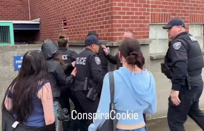 Lunatic leftist throws a punch, then cops show up and it's LIGHTS OUT