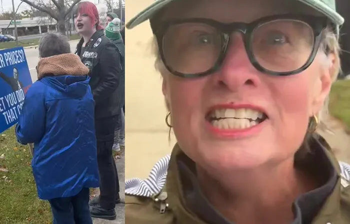 Woman holding sign that makes NO SENSE has epic meltdown