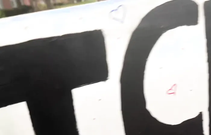 Woman holding sign that makes NO SENSE has epic meltdown