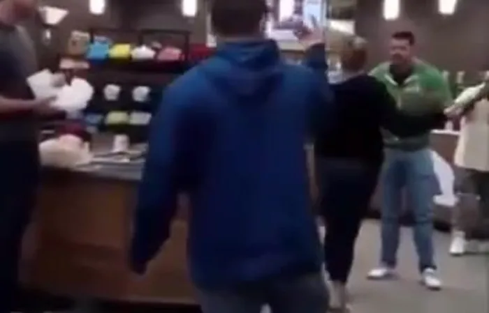 Woman fights a guy in Wawa
