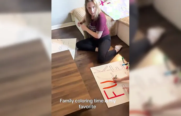 Parent forces child to make profane anti-ICE sign