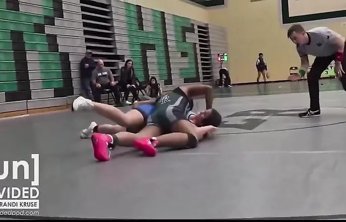 Female wrestler touched inappropriately by male wrestler