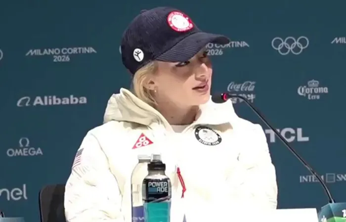 USA figure skater trashes America, but has NO EXAMPLES to back it up