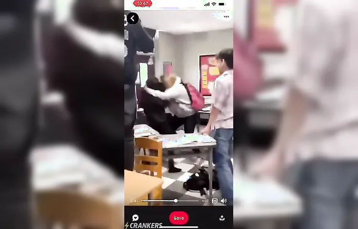 Girl pokes pencil in girl’s face OUCH