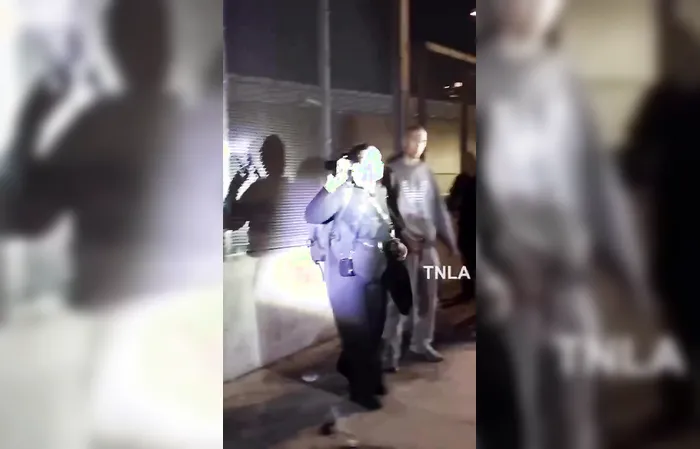 ICE-hating Male agitator attacks female reporter from behind