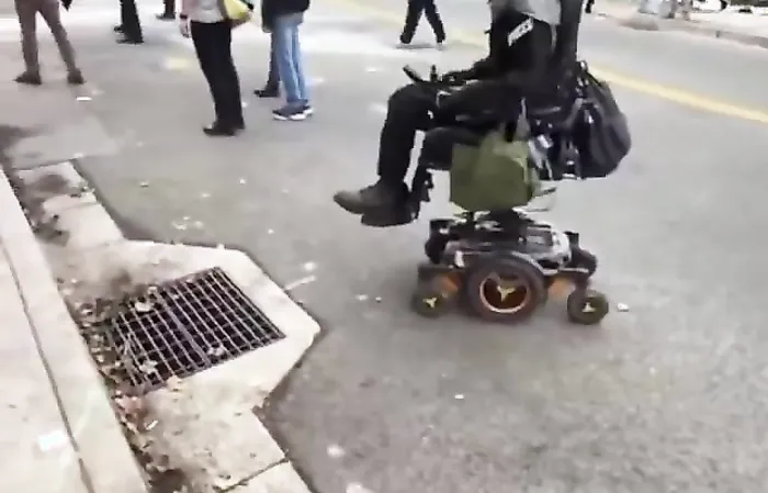 Wheelchair bound ICE protester seems to have a divine intervention