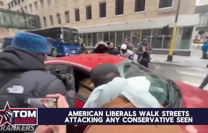 Protesters storm random car for no reason, this is getting tiring